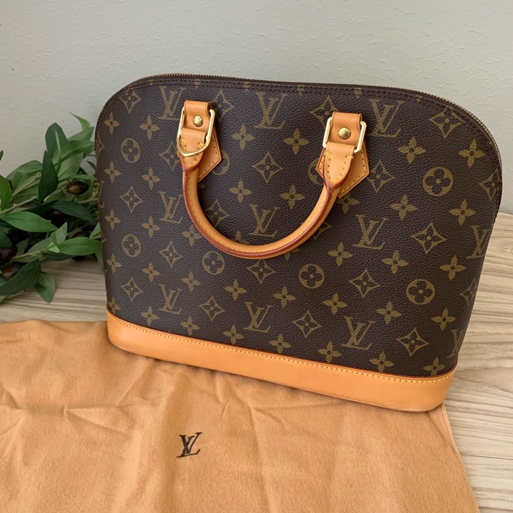 Louis Vuitton Alma Pm Monogram Leather Handbag